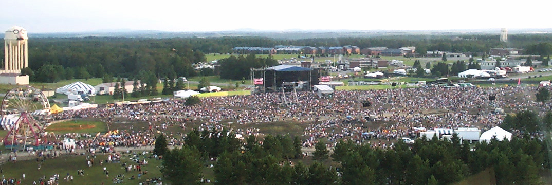 Aerial view of Phish IT Festival main stage and massive crowd Loring AFB Limestone ME 2003