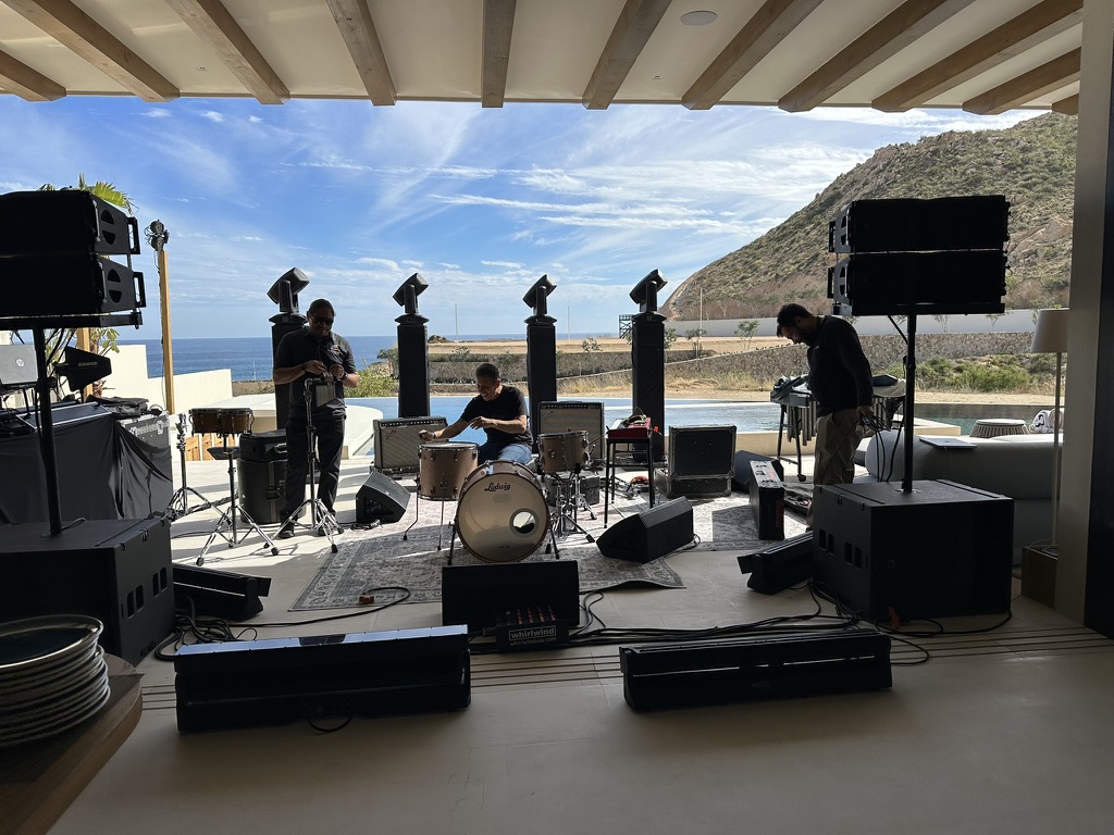 Band soundcheck on covered terrace ocean view private estate Cabo San Lucas Baja